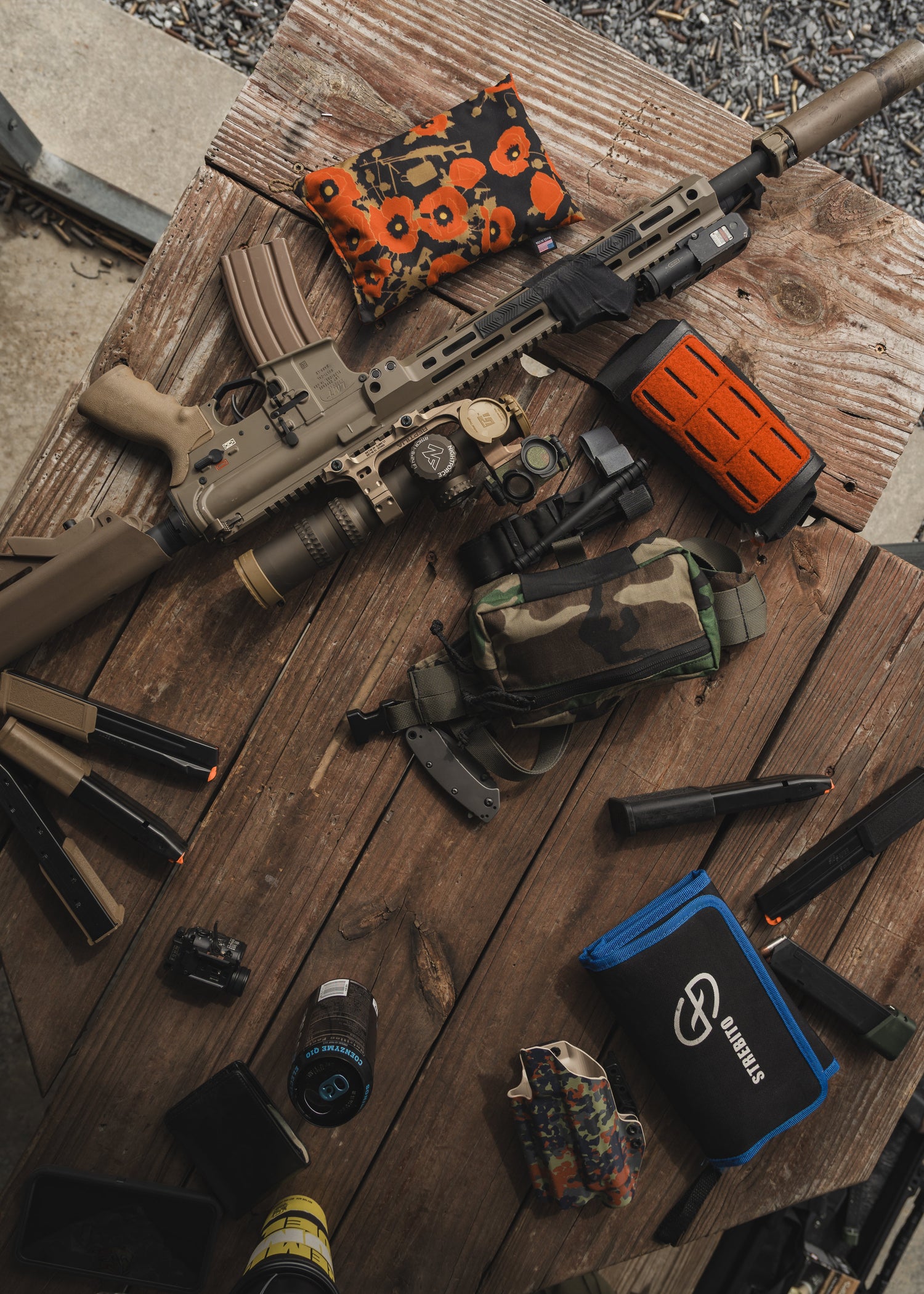 Firearm accessories including optics, weapon lights, magazines, slings, and tactical equipment.