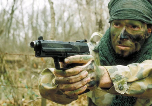 HK USP9 tactical being held by Seal operator