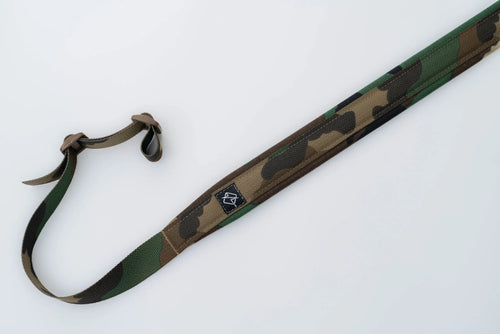 "Image of the Flatline Fiber Co. Padded Rifle Sling, featuring a durable, padded design for enhanced comfort during extended use, with adjustable straps and quick-release buckles for versatile and secure firearm carry."
