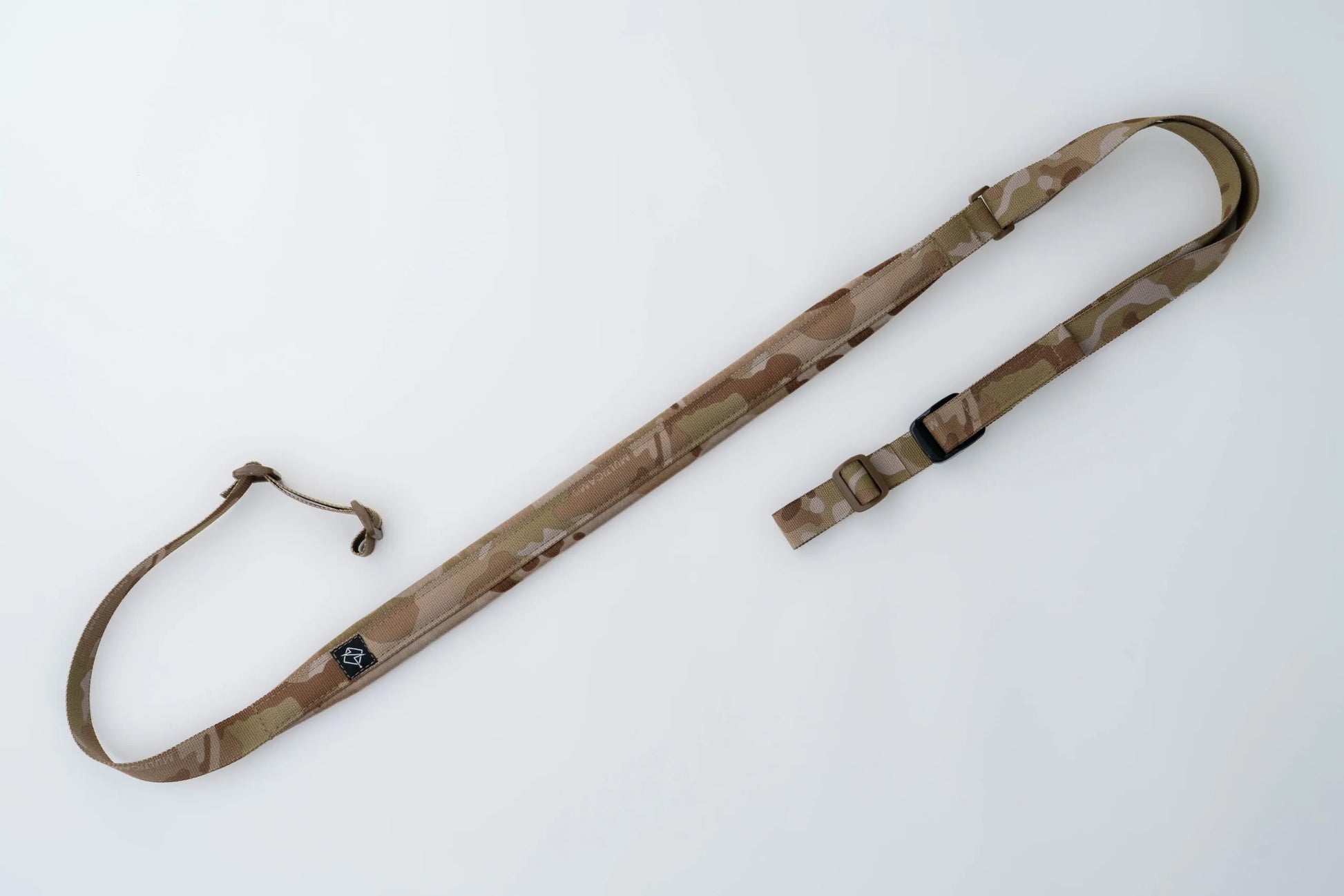 "Image of the Flatline Fiber Co. Padded Rifle Sling, featuring a durable, padded design for enhanced comfort during extended use, with adjustable straps and quick-release buckles for versatile and secure firearm carry."