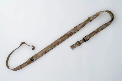 "Image of the Flatline Fiber Co. Padded Rifle Sling, featuring a durable, padded design for enhanced comfort during extended use, with adjustable straps and quick-release buckles for versatile and secure firearm carry."
