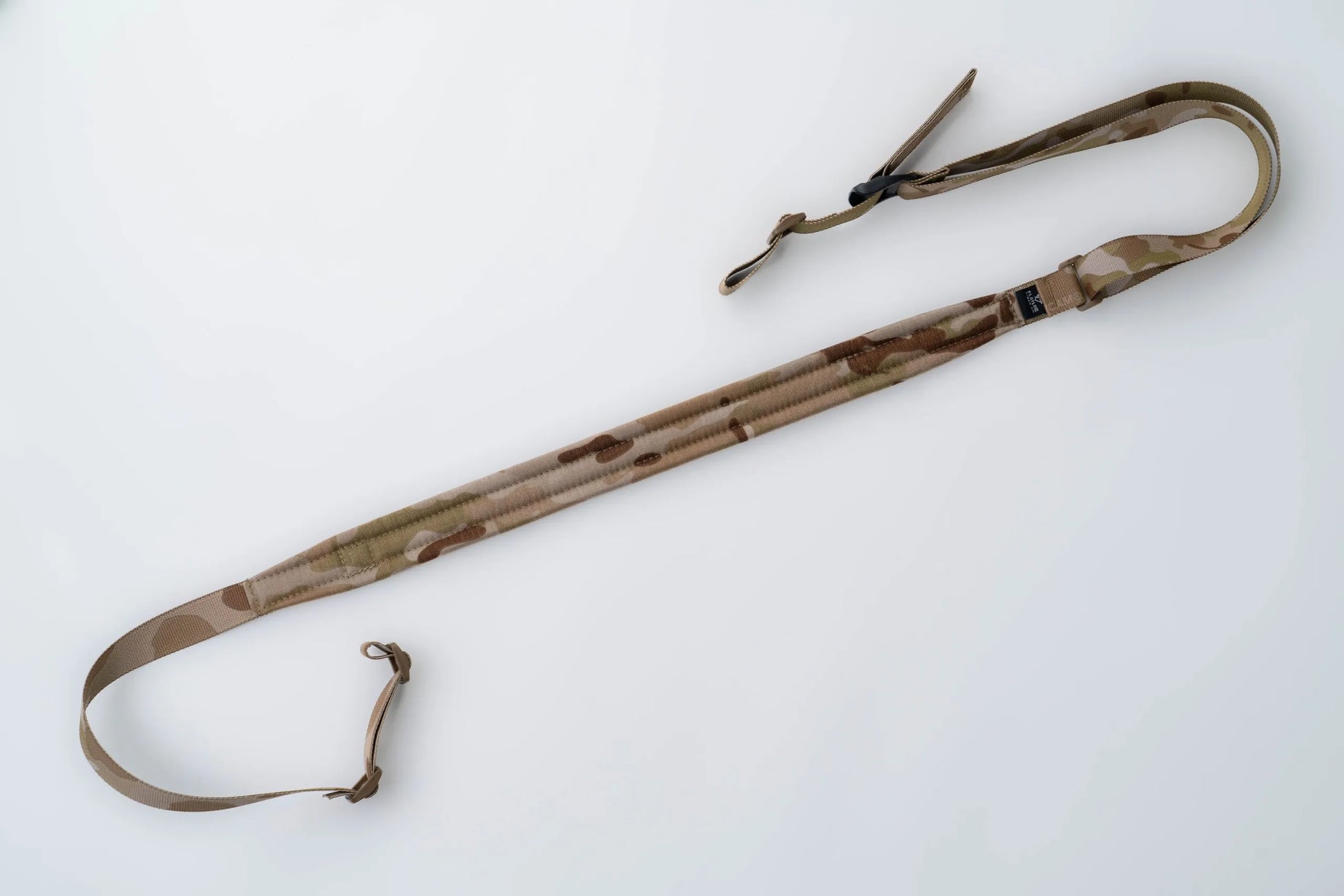 "Image of the Flatline Fiber Co. Padded Rifle Sling, featuring a durable, padded design for enhanced comfort during extended use, with adjustable straps and quick-release buckles for versatile and secure firearm carry."