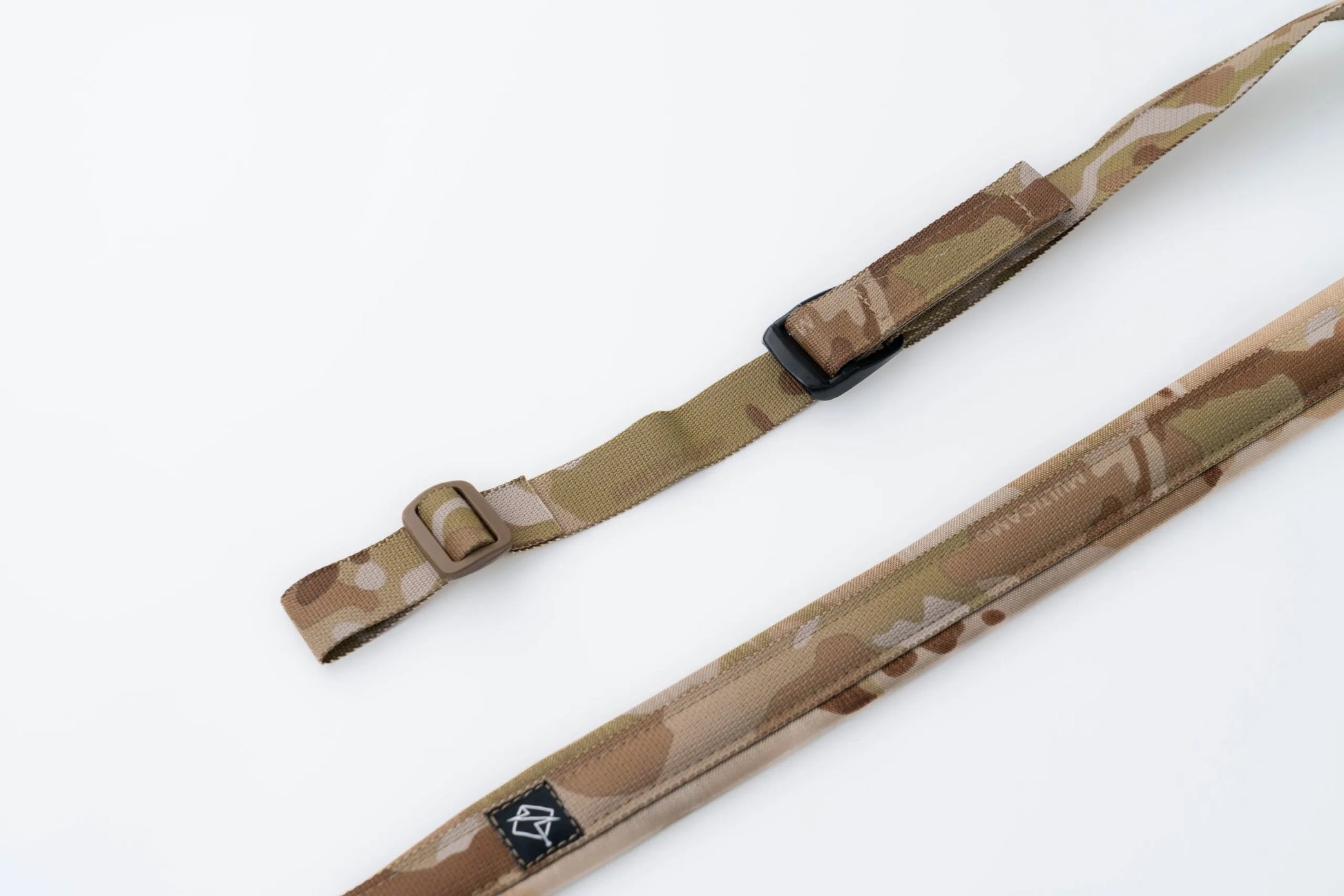 "Image of the Flatline Fiber Co. Padded Rifle Sling, featuring a durable, padded design for enhanced comfort during extended use, with adjustable straps and quick-release buckles for versatile and secure firearm carry."