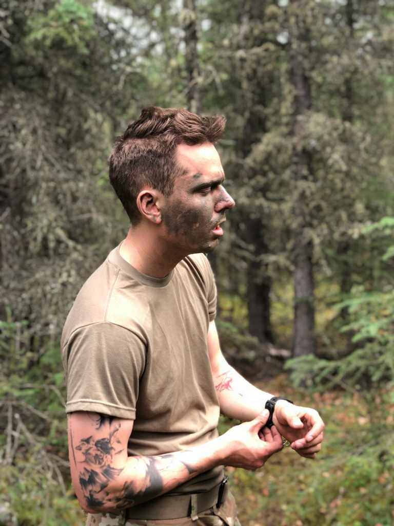 IntelGoons founder serving as an Army infantryman during field operations
